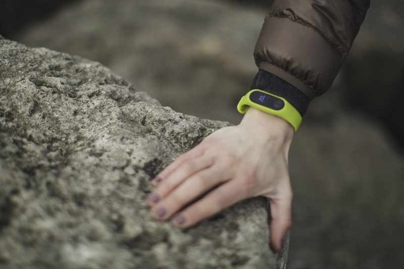 outdoors, person, fitness, tracker, real people, solid, wearing, hand, finger, statistics, human body part, rock - object, day, sport, people, fitbit, leisure activity