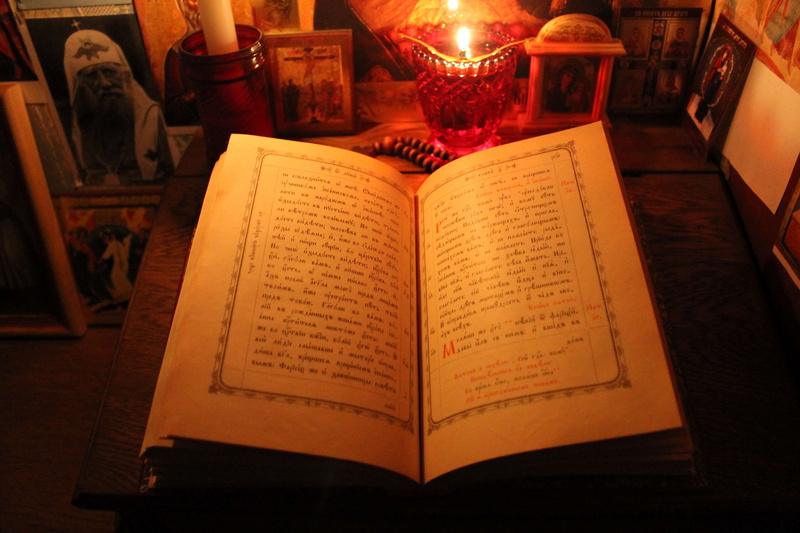 reading the new testament, domestic room, open, illuminated, candle, opened orthodox book, paper, opened gospel, 4K, no people, book, publication, indoors