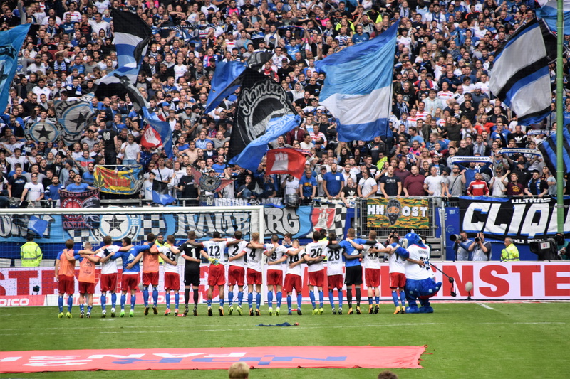 volksparkstadion, text, athlete, large group of people, stadium, men, seat, crowd, emotion, arena, spectator, day, person, outdoors, real people, group of people