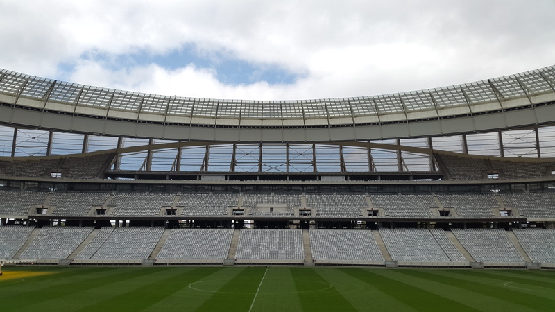 travel destinations, arena, modern, africa, soccer, cloud - sky, sport, group of people, building exterior, travel, built structure, day, grandstand, low angle view