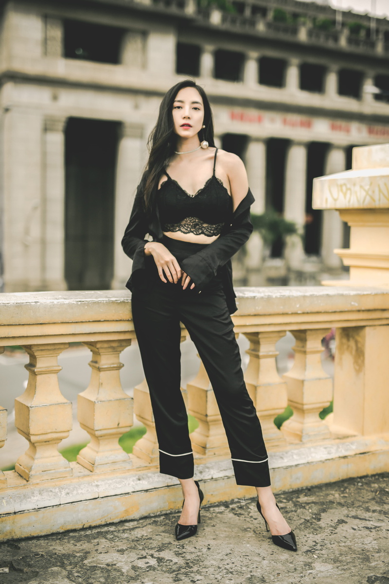 asian, full length, standing, one person, hairstyle, young women, daytime, architectural column, model, woman, concrete, fashion, style, portrait, architecture