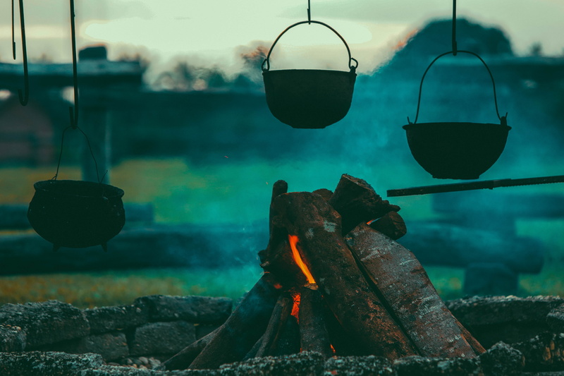 household equipment, cooking pots, bricks, glowing, metal, electric lamp, close-up, day, silhoutte, cooking, fire - natural phenomenon, lighting equipment