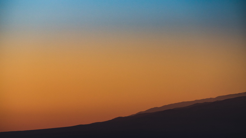 scenics - nature, sunset, sun, blue, skyscape, beauty in nature, environment, silhoutte, orange color, outdoors, non-urban scene, silhouette, sky, tranquility
