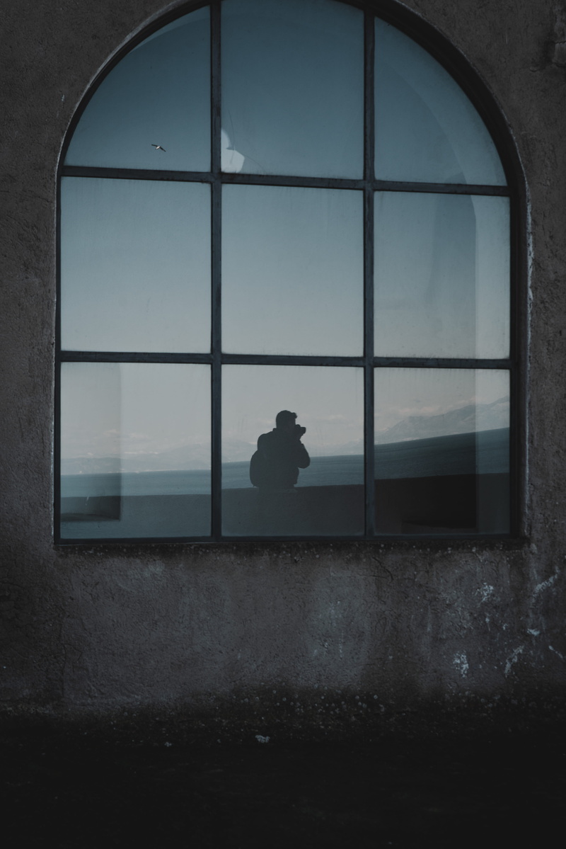 sky, real people, transparent, glass, architecture, day, unrecognizable person, building, indoors, men, glass - material, one person, man, window frame