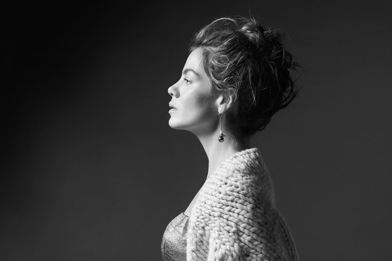 looking away, michelle monaghan, hairstyle, leisure activity, Girls, indoors, beautiful woman, profile view, copy space, black background, monochrome, portrait