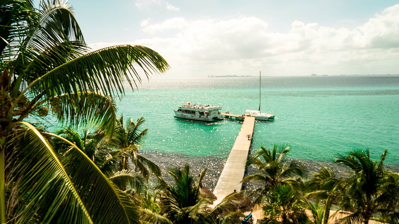 sunset, beauty in nature, cloud - sky, outdoors, sky, sea, isla mujeres, bay, ocean, tranquility, nautical vessel, tropical climate, mode of transportation