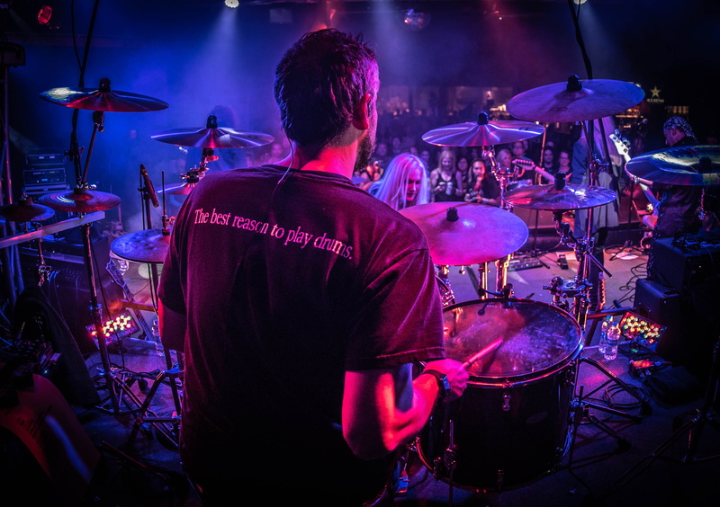 popular music concert, fife, drum, drummer, festival, light, arts culture and entertainment, dark, music, performance, event, artist, men, stage light
