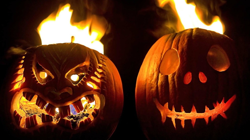 black background, creativity, halloween, representation, jack o lantern, art and craft, food, jack o lantern, close-up, food and drink, decoration, lighting