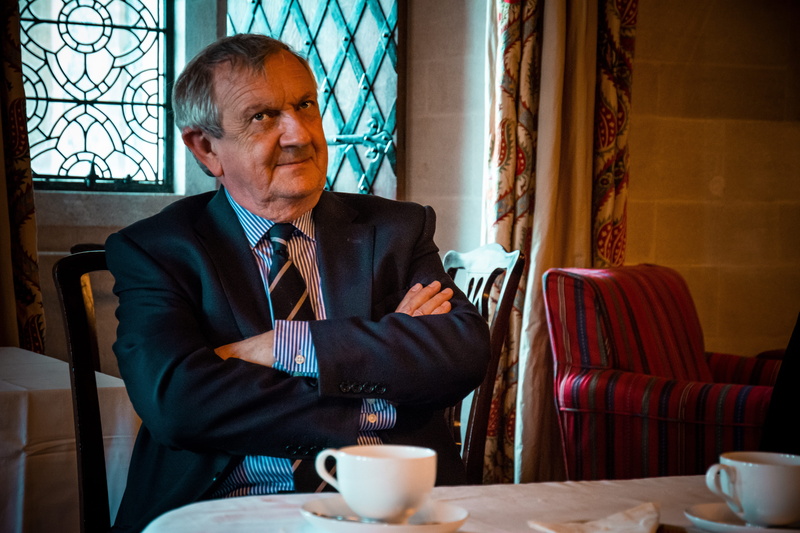 food and drink, arundel, indoors, real people, business person, businessman, 5K, cup, adult, table, contemplation, united kingdom, suit, sitting, mature adult