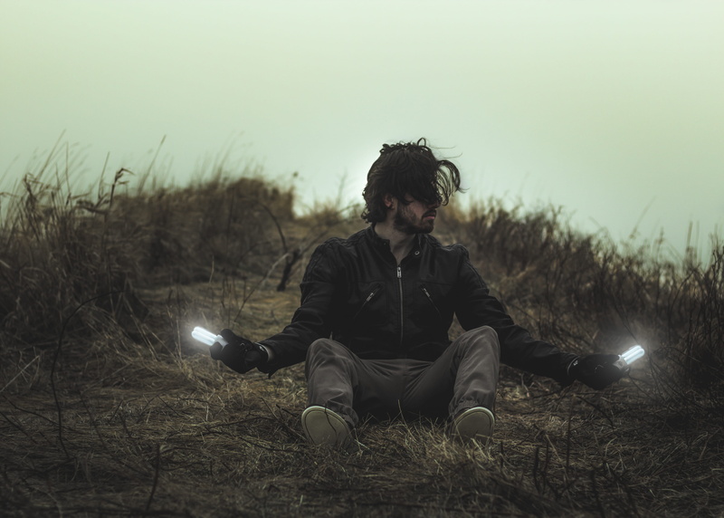 dark, underexposed, leather, leisure activity, beard, 4K, bulbs, daytime, lifestyles, casual clothing, one person, dried, lights, full length, bulb, ground