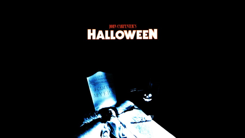 indoors, western script, transportation, halloween 1978, arts culture and entertainment, representation, illuminated, dark, single word, 1080P, night