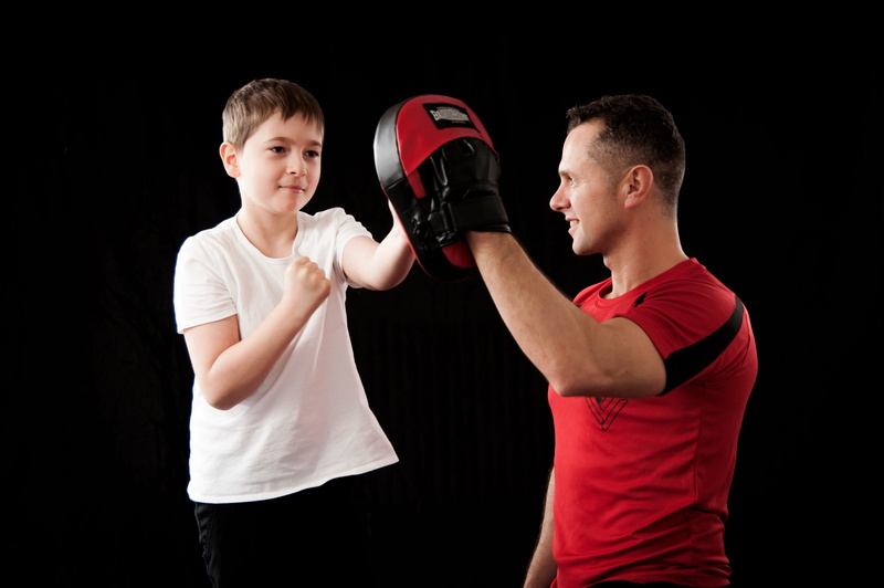 boxing glove, boxing - sport, exercising, kickboxing, standing, aggression, boxer, students, self-defense, men, waist up, krav maga, security, children