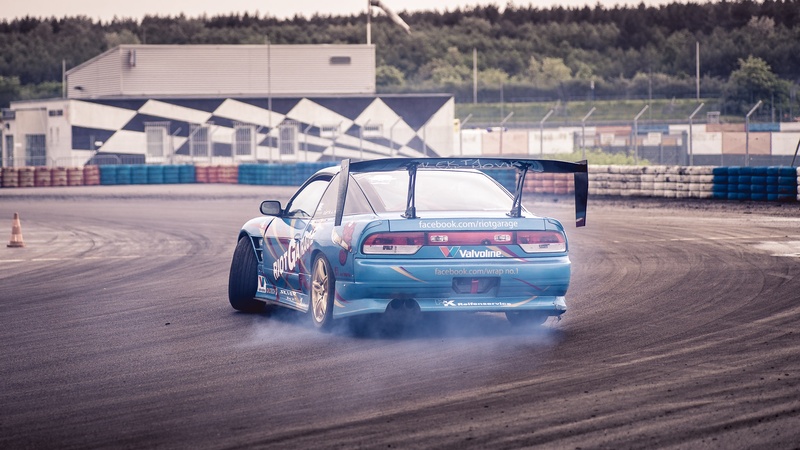landscape format, on the move, hood, vehicle, wheels, outdoors, travel, car, speed, motor vehicle, rush, rally, motion, helm, competition, sport, colorful