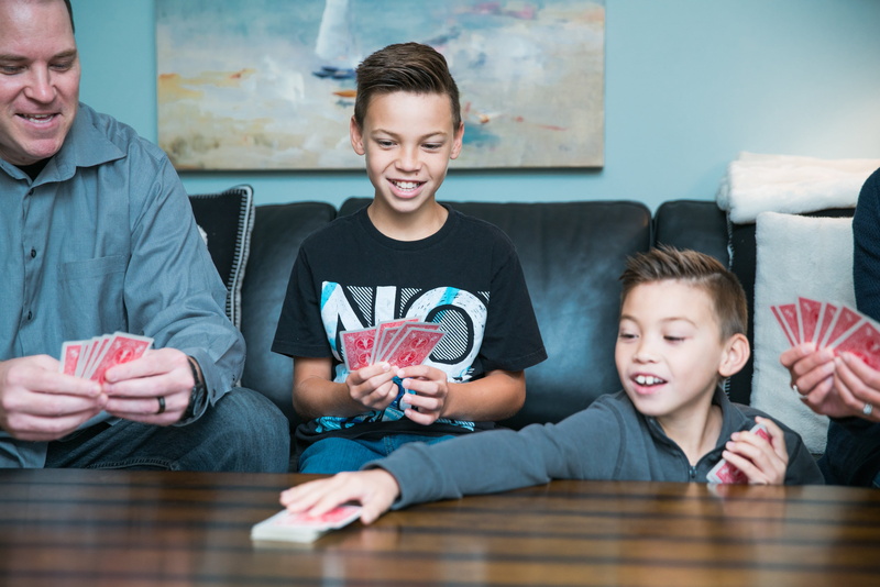 happiness, front view, Children, males, leisure games, Fun, Playtime, Boys, smiling, men, sitting, 4K, Family, leisure activity, cards, table, offspring