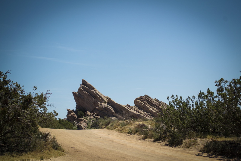 landscape, non-urban scene, no people, national park, tree, sky, clear sky, beauty in nature, solid, rocks, arid climate, rock, vasquez rocks, brush, rock - object