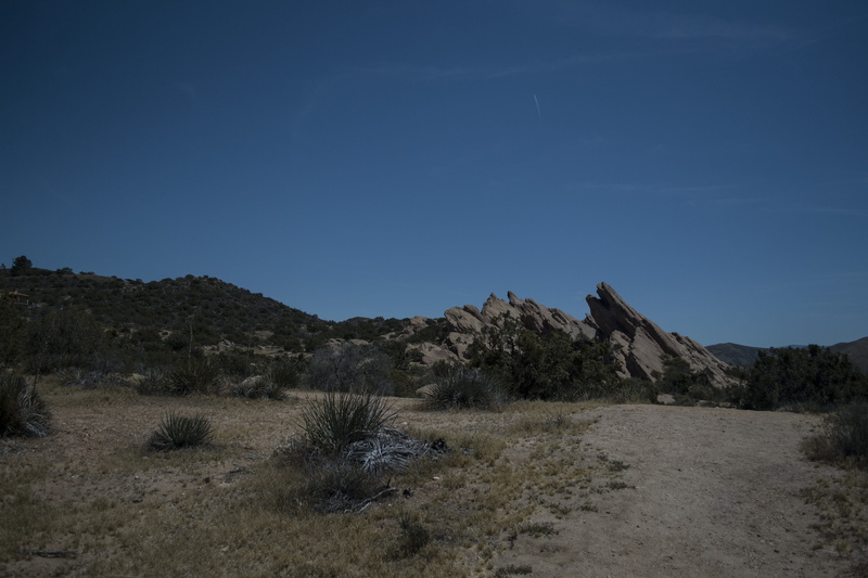 desert, blue, clear sky, united states, beauty in nature, copy space, environment, outdoors, land, rocks, sky, plant, landscape, non-urban scene, road