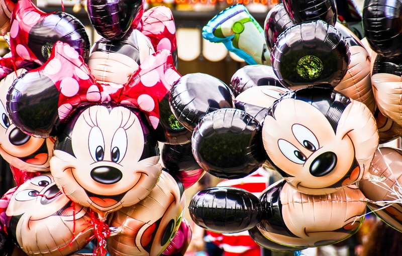 human representation, happy, 2K, day, colourful, Minnie Mouse, smile, focus on foreground, large group of objects, small business, disguise, disney, retail