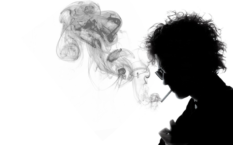 activity, headshot, portrait, cigarette, side view, white background, smoking - activity, musician, social issues, smoking, bad habit, hairstyle, smoke - physical structure