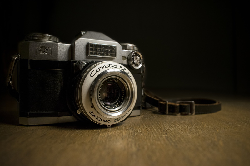 black background, black color, slr camera, 5K, lens - eye, chrome, gray, studio shot, digital camera, lens - optical instrument, camera - photographic equipment
