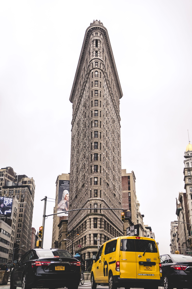 land vehicle, town, vehicle, high rise, city, office building exterior, new york, transportation, city street, mode of transportation, nyc, flatiron, built structure