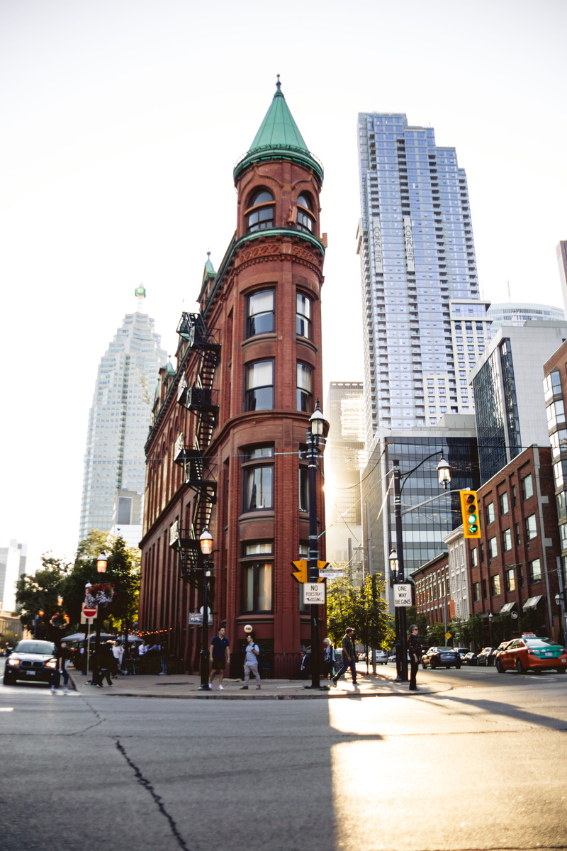 tower, city life, flatiron building, group of people, city, sky, canada, day, skyscraper, spire, modern, gooderham building, motor vehicle, building, car