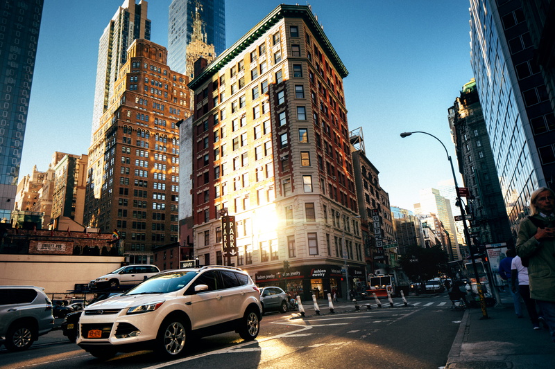  cars, sunlight, sky, 5K, car, near, new york, skyscraper, mode of transportation, building, mac, city, motor vehicle, land vehicle
