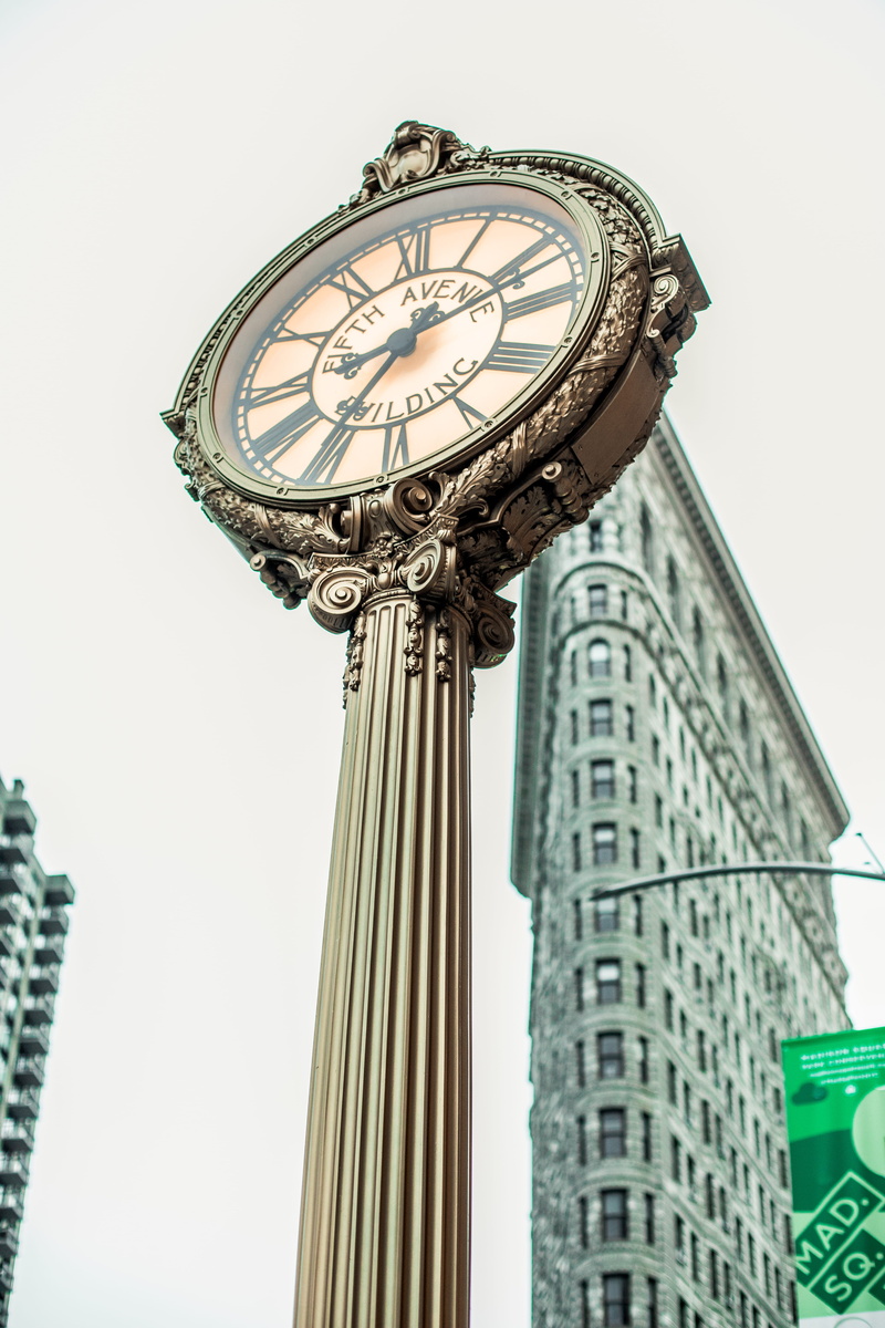 new york, building, decorative clock, street, near, built structure, flatiron building, clear sky, new, clock, architectural column, avenue, york, nature