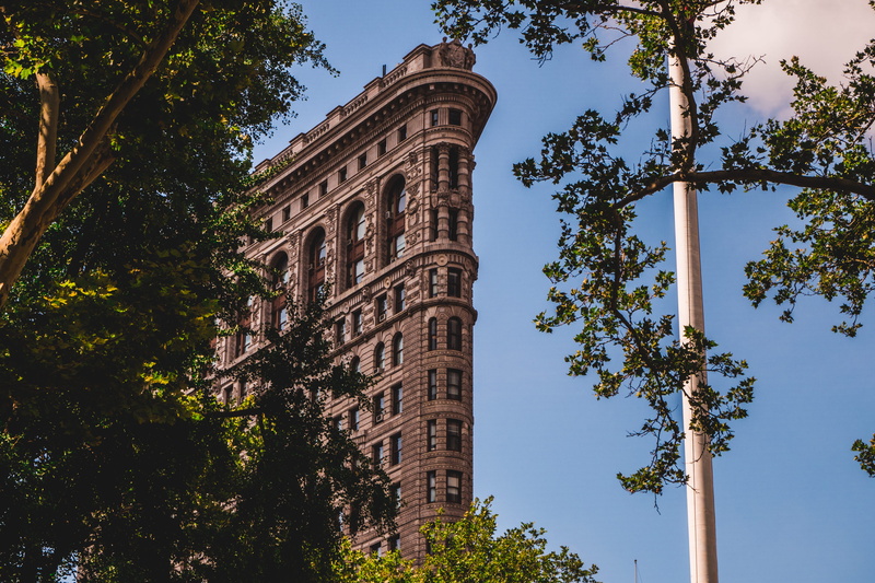clear sky, new york, day, flatiron, built structure, iconic, leafed, travel destinations, archaeology, low angle view, city, brown, growth, architecture