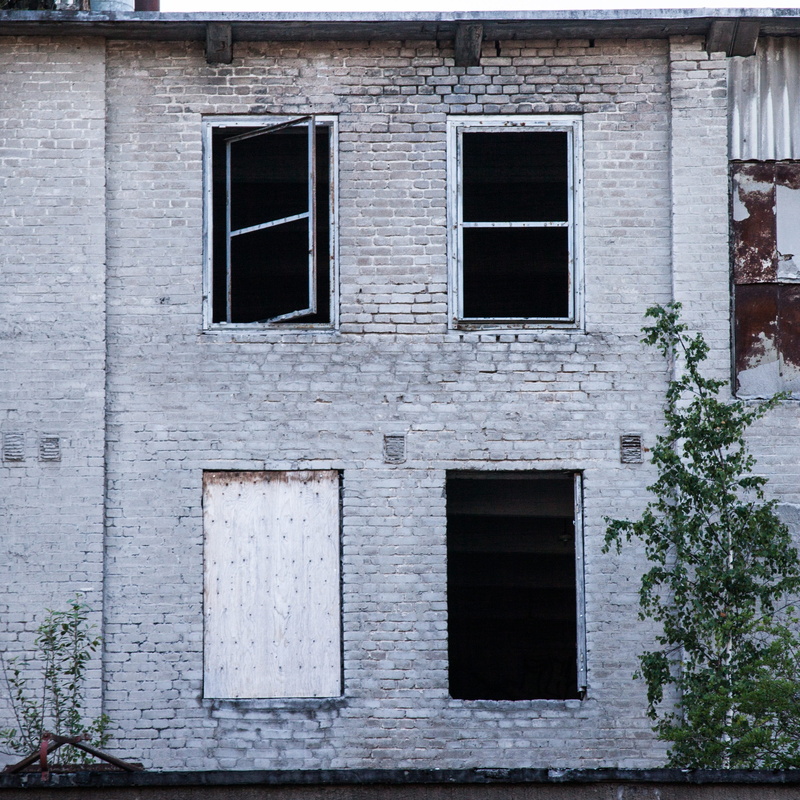 built structure, scrap, metal, low angle view, window, no people, wreck, industrial, antique, rusting, closed, empty, day, broken windows, rust, abandoned factory