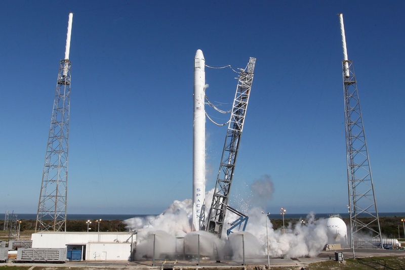 propulsion, launch pad, factory, flying, no people, building exterior, rocket engine, daytime, shuttle, air pollution, architecture, vehicle, power, speed