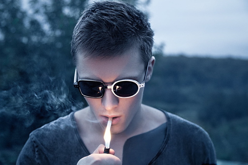 young men, men, real people, burning, front view, lighter, portrait, glasses, holding, 720P, cigarettes, leisure activity, headshot, nature, one person