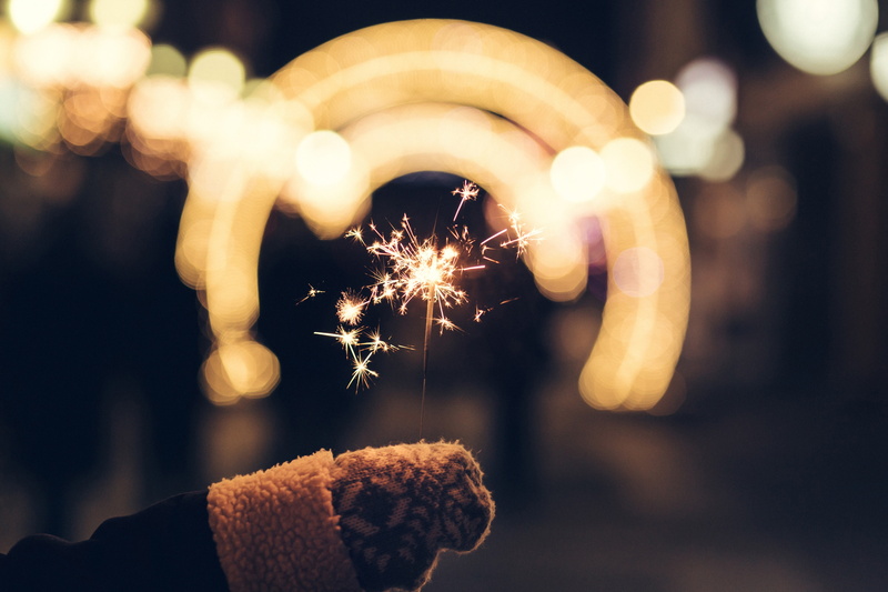 gloves, finger, outdoors, holding, lights, night, motion, event, celebration, firework display, blurred motion, one person, burning, lighter, illuminated