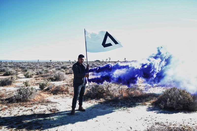 man, full length, young adult, holding, 4K, casual clothing, desert, nature, real people, flag, day, men, sky, blue, leisure activity, smoke, united states