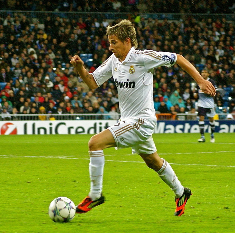 competition, athlete, football, fabio coentrao, kicking, person, sports, people, soccer uniform, sport, ball, game, grass, team sport, real madrid, sports equipment