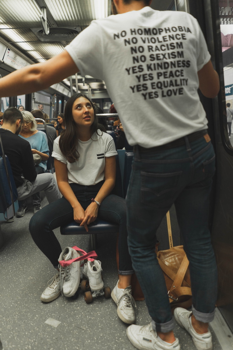 wear, roller skates, front view, indoors, full length, vehicle, incidental people, public transportation, woman, mode of transportation, transportation