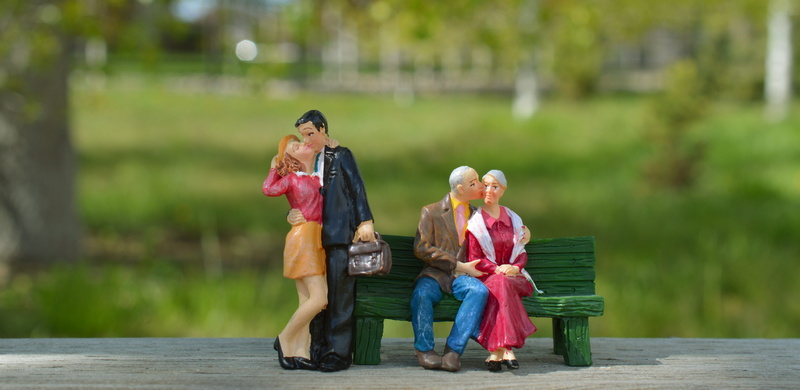 childhood, Romance, happy, kiss, bench, lifestyles, day, couples kissing, women, emotion, sitting, casual clothing, man, outdoors, real people, Couples
