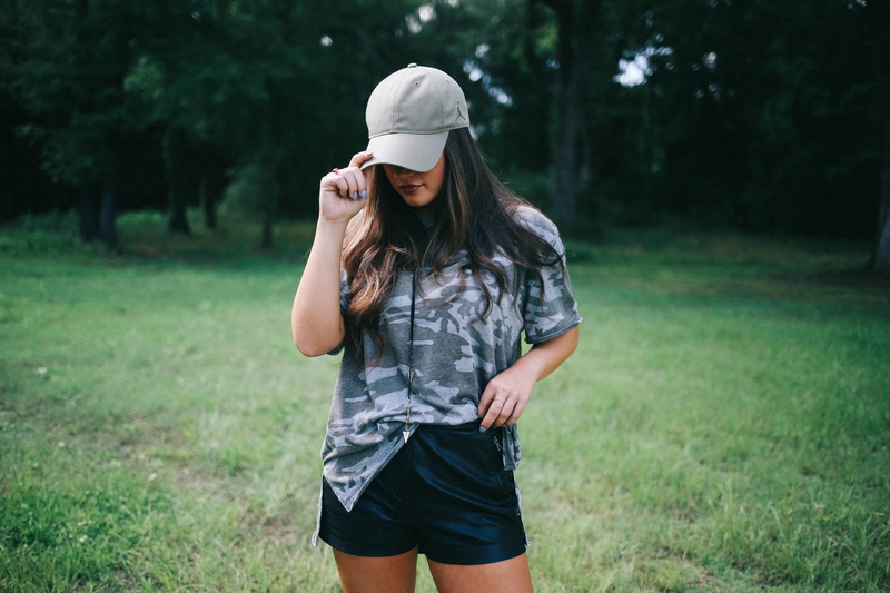 leisure activity, hat, hair, girl, long hair, focus on foreground, green, standing, nature, only women, camoflauge, wearing, woodland, front view, young women