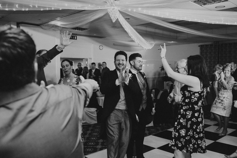 real people, room, large group of people, party - social event, indoors, standing, black, nightlife, women, group, men, dancing, lifestyles, party, human arm
