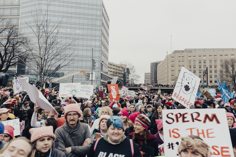 crowd, aggression, city, 5K, banner - sign, daytime, near, real people, large group of people, signage, outdoor, emotion, outdoors, day, message, women