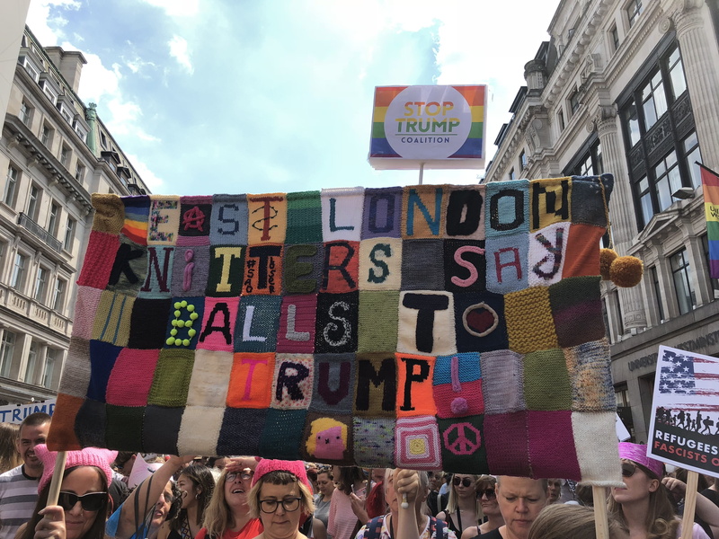 politics, human, audience, text, real people, city, protest, placard, trump, march, knitting, cloud - sky, signage, orange, banner, american government