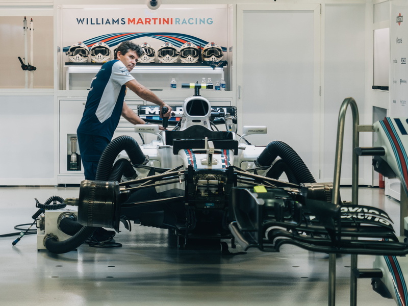 full length, people, seat, racecar, young adult, repair, engineer, black, healthcare and medicine, occupation, side view, maintenance, men, man, pit stop