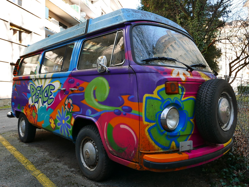 camper, colorful, tree, outdoors, motor vehicle, day, wheel, transportation, reflection, multi colored, retro styled, geneva, plant, road, vw, no people