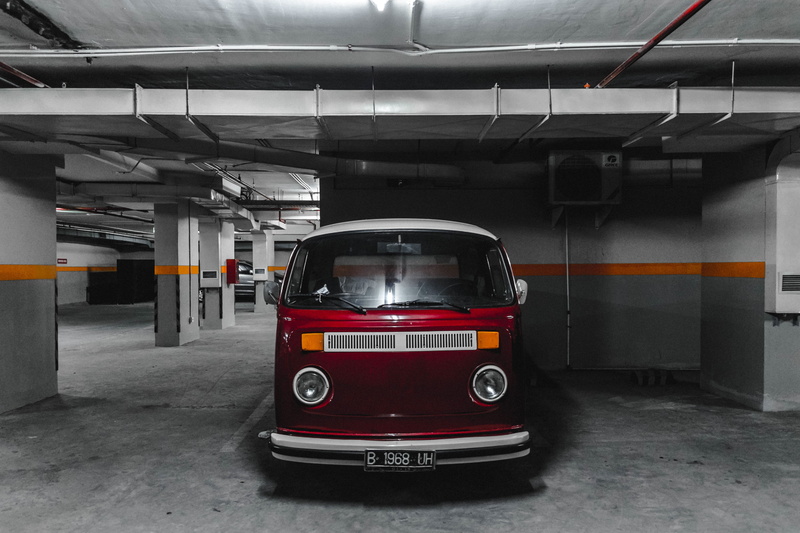 transportation, motor vehicle, public transportation, day, vw, car, sign, parked, mode of transportation, parked vw, land vehicle, parking lot, parking