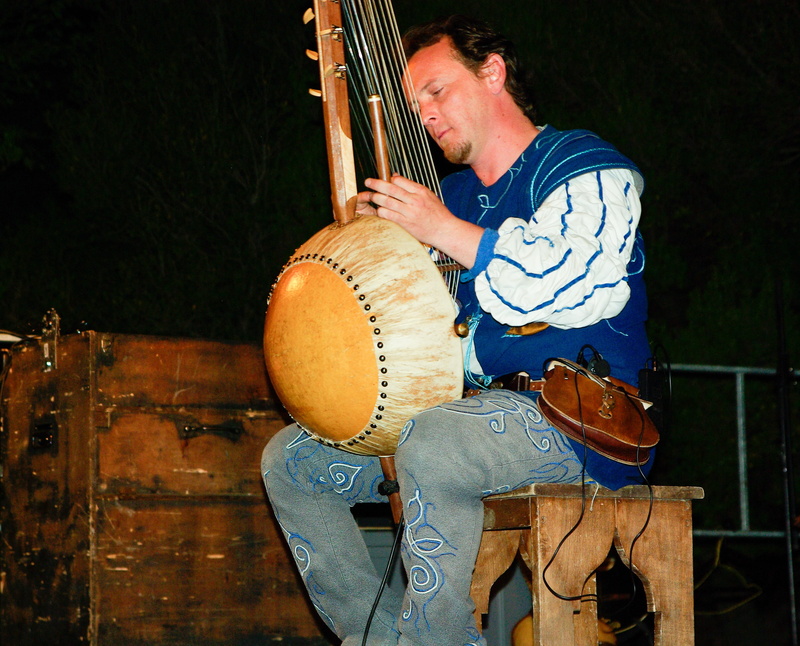 working, musical instrument, skill, 2K, adult, casual clothing, standing, mid adult, musical equipment, wood - material, lifestyles, music, occupation