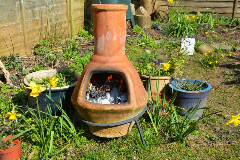 plant, nature, earthenware, red, fireplace, high angle view, brown, pit, container, outdoor, rustic, flowering plant, clay, smoke, winter, day, equipment