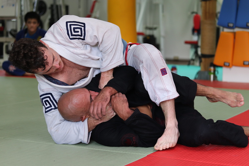 bokeh, men, exercise, strength, apparel, two people, jutsu, adult, ankle, exercising, sitting, person, judo, two, wrestling, jiu, relaxation, sports clothing