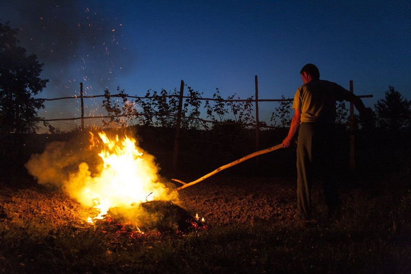 illuminated, hose, blue, people, fire - natural phenomenon, wood, occupation, communication, person, fire, men, nature, bonfire, yellow, fall, playing with fire