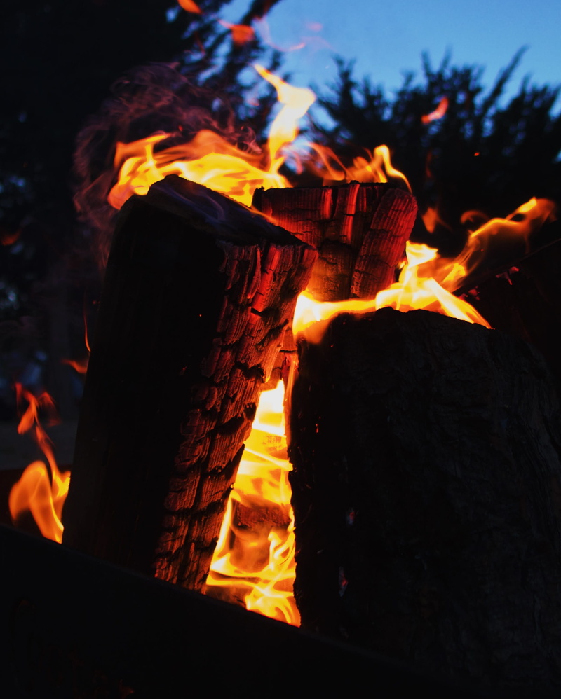 orange color, motion, dark, pescadero, coal, firewood, fire, outdoors, s, camping, hearth, heat - temperature, burning, campfire, wood, person, human, usa