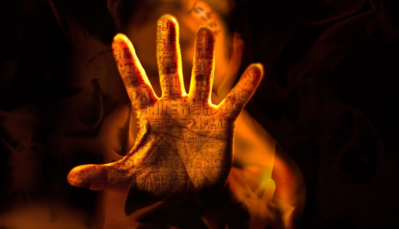 body part, fingers, bizarre, finger, words, left, spooky, 4K, indoors, human body part, fire, black background, rosetta stone, human, horror, mystery