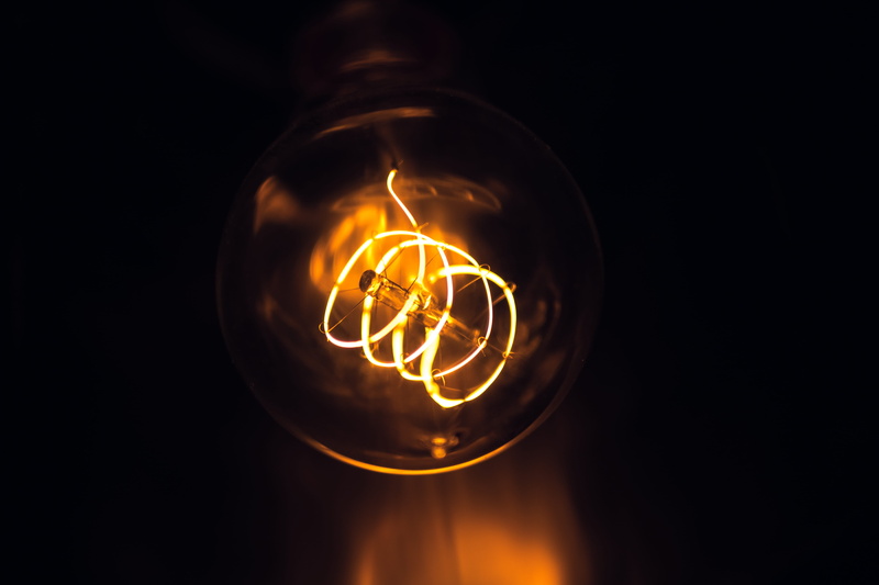 black background, glowing, no people, creative, lighting, lighting equipment, flame, lamp, copy space, idea, headlight, bright, night life, luminosity